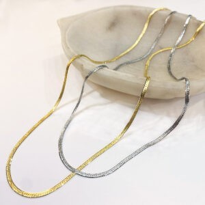 flat herringbone chain in silver and gold